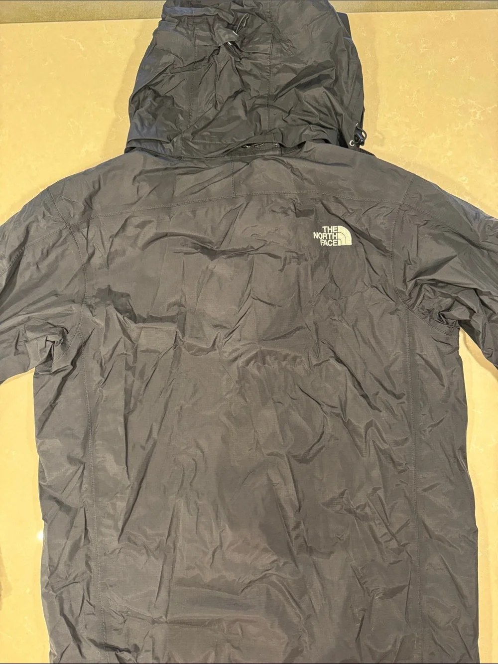 The North Face Men's Hooded Rain Jacket in Black